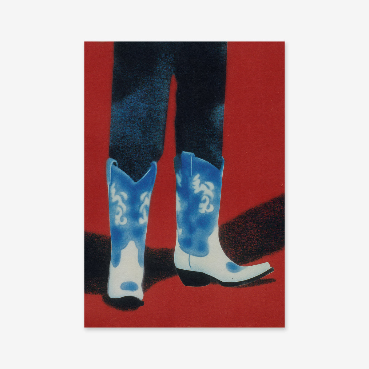 A person in dark pants and white Cowboy boots with blue designs stands on a red surface, casting a shadow—captured as giclée art print, ideal for adding bold style to modern interiors.