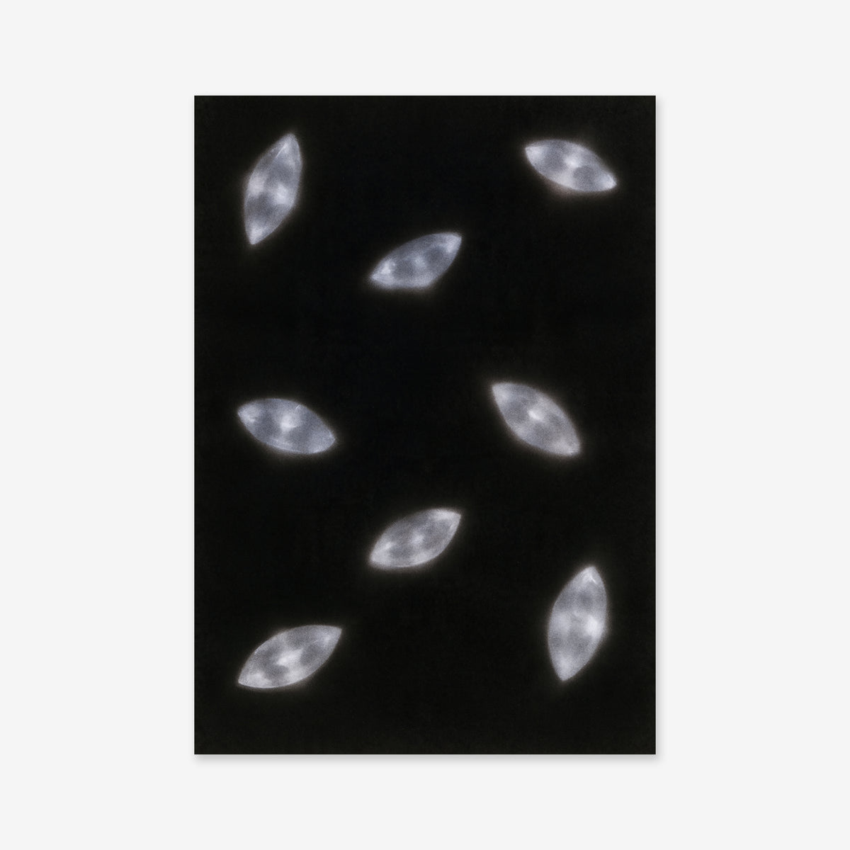 Diamonds falling art print features seven glowing, oval-shaped light patterns scattered across a black background.