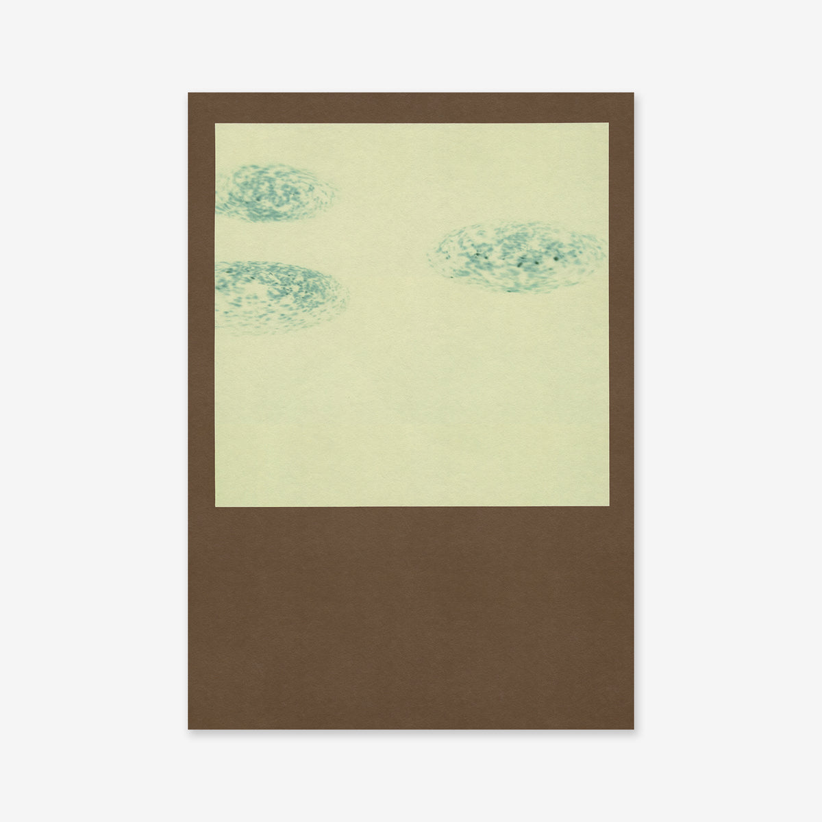 Galaxies No. 6: A brown-bordered photo frame featuring a pale green image with three blurred blue-green ovals near the top left, evoking abstract clouds—an ideal giclée art print for modern interiors.