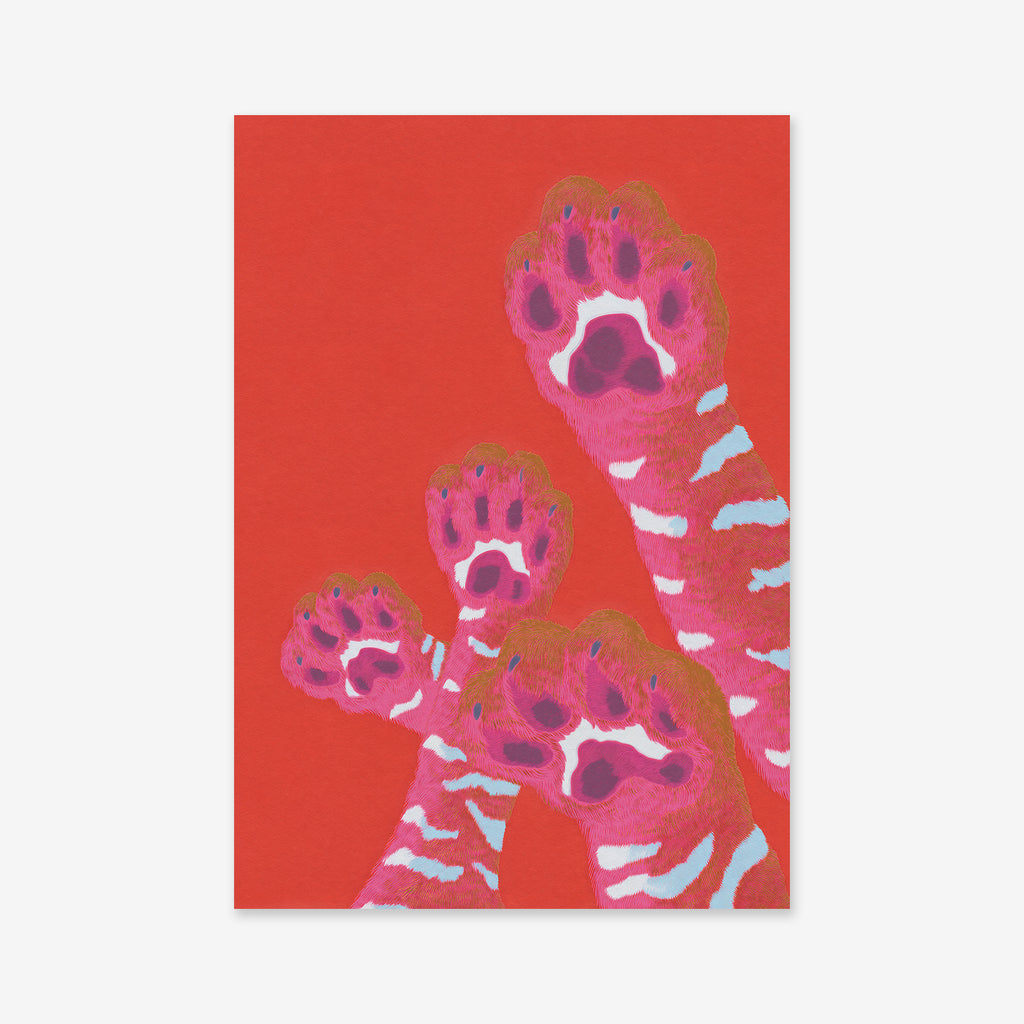 Paws" features three pink cat paws with white stripes and dark pink pads, raised against a vibrant red background—ideal as a Giclée art print for stylish modern decor.