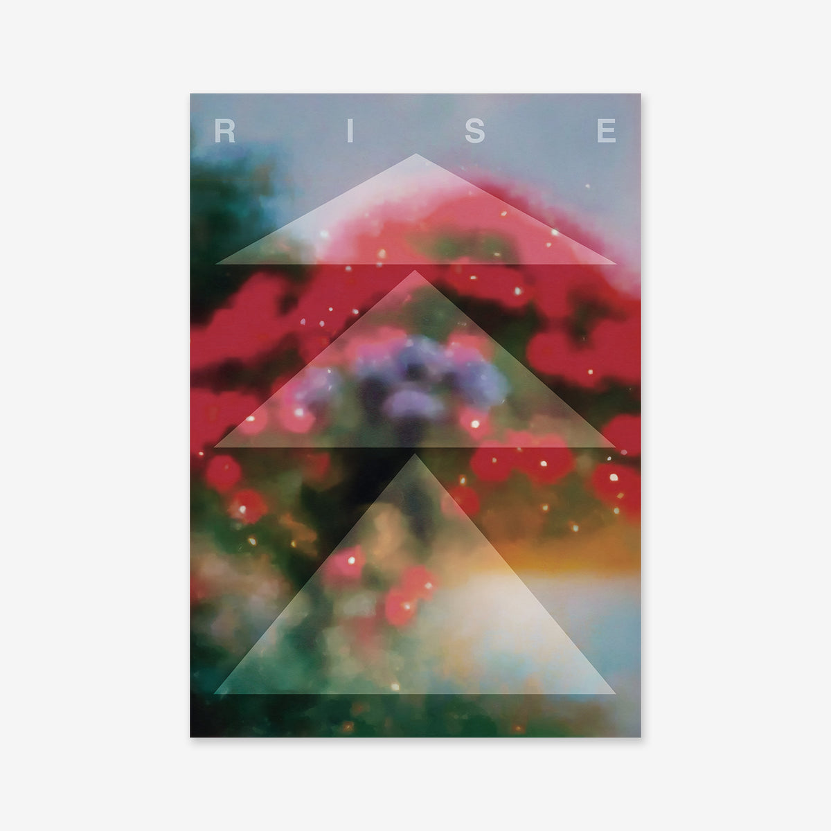 Rise is a modern interior giclée art print featuring a blurred, colorful background with red, green, and purple hues, three overlapping white upward-pointing triangles, and the word "RISE" in large letters across the top.