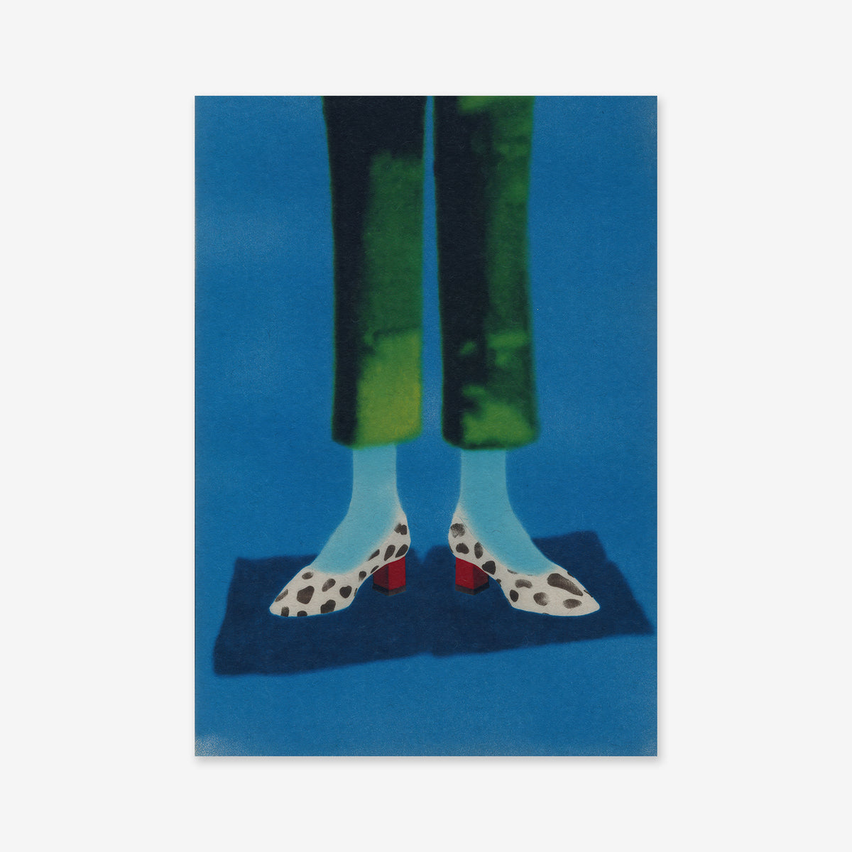 “Woman legs No. 1” shows a figure in green pants and blue socks standing on a blue surface, white shoes with black spots and red heels popping against the bold background—a striking Giclée art print for modern interiors.